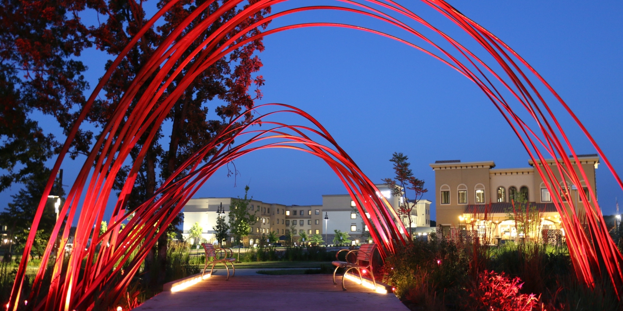 red arch walkway at night